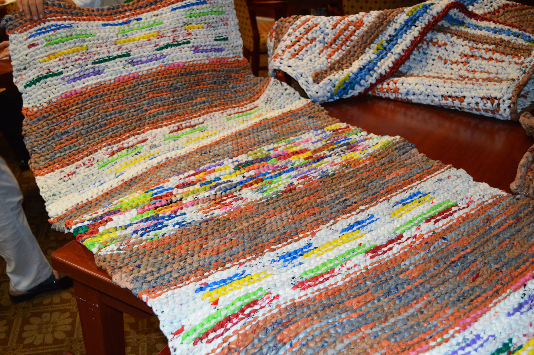 Homeless benefit from seniors' project to upcycle grocery bags